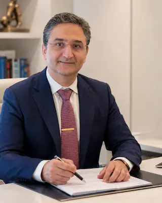 Consultant dermatologist examining a patient at Skinhorizon Clinic, London